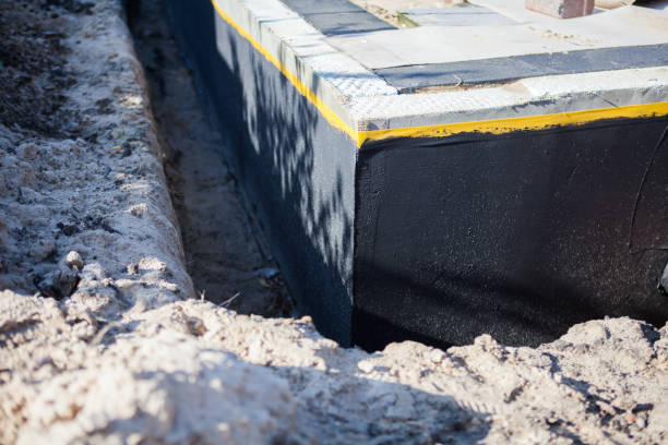 Professional Waterproofing technician working in Clarendon Hills, IL